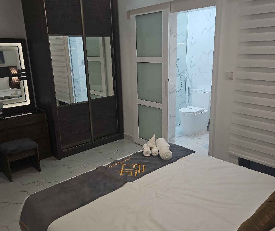 Aina Residency Beachfront Hotel