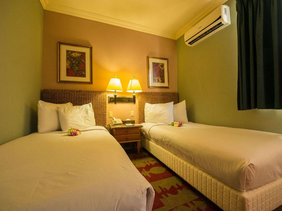 塔穆宁华美达酒店及套房主图