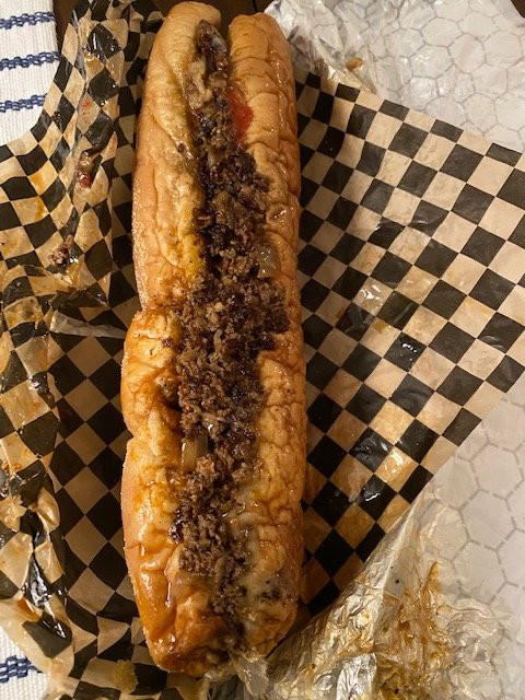 Slice of Martinez Pizza & Cheesesteaks