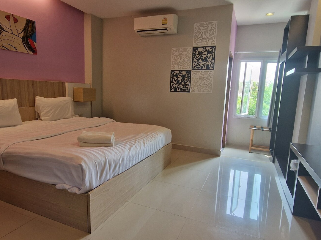 The Cozy Nest Boutique Rooms主图