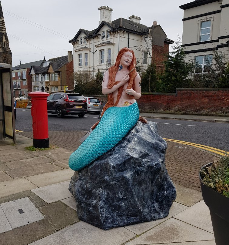 The Ebb & Flow Mermaid Statue