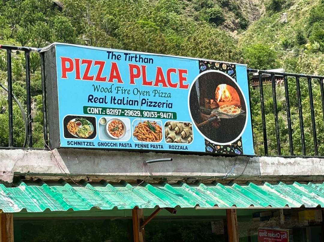 the Tirthan Pizza place