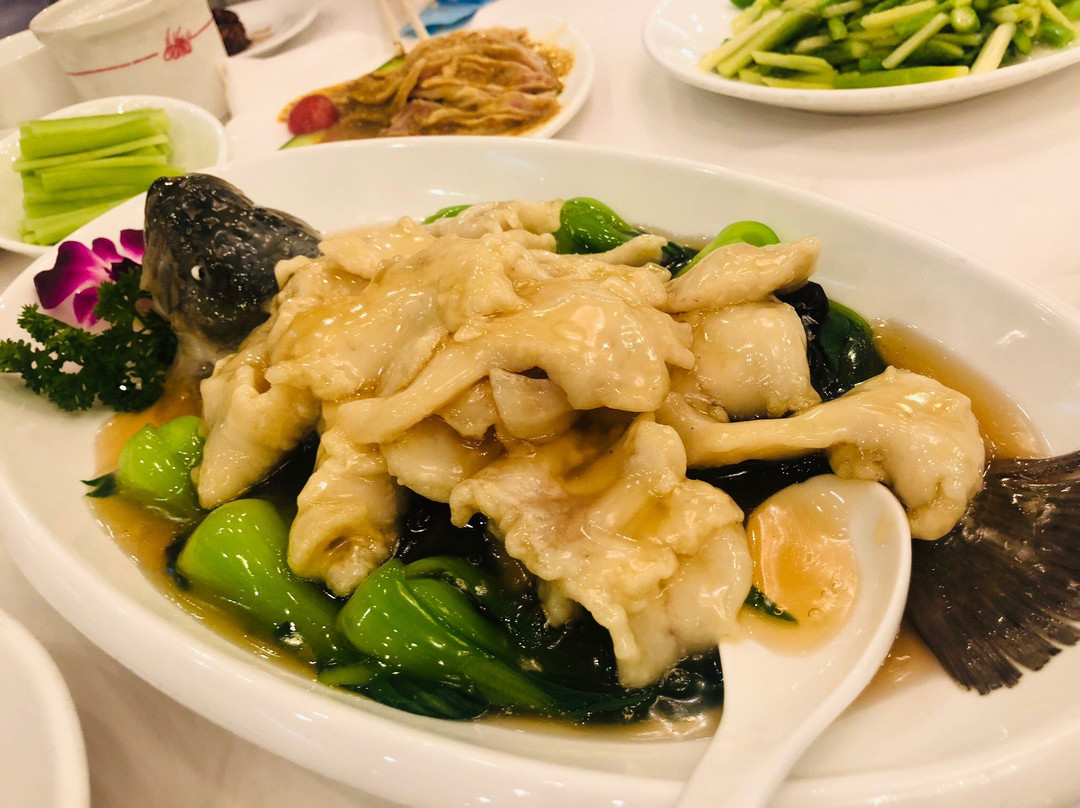 九花山烤鸭店主图