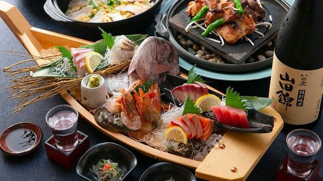 酒房うおまん LINKS UMEDA店主图