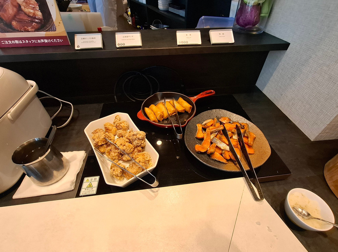 带广站前里满士酒店主图
