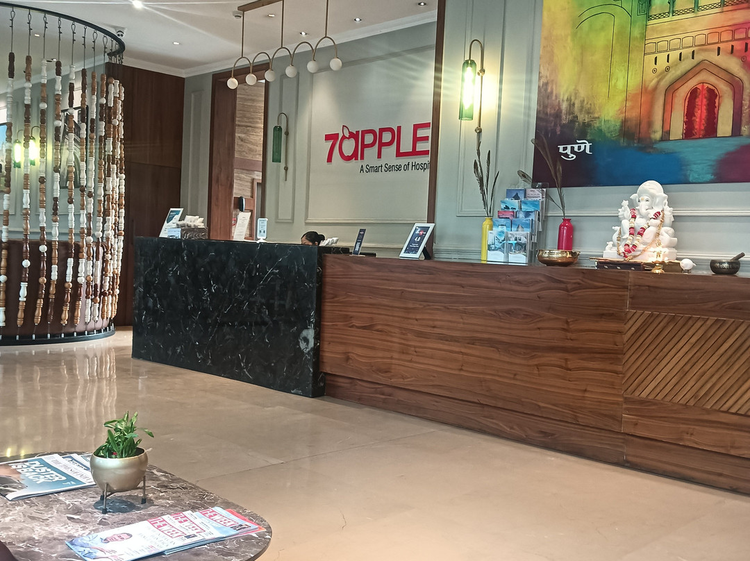 浦那维曼纳加尔7苹果酒店主图