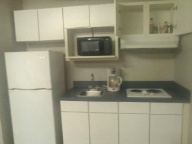 Studio Inn & Suites