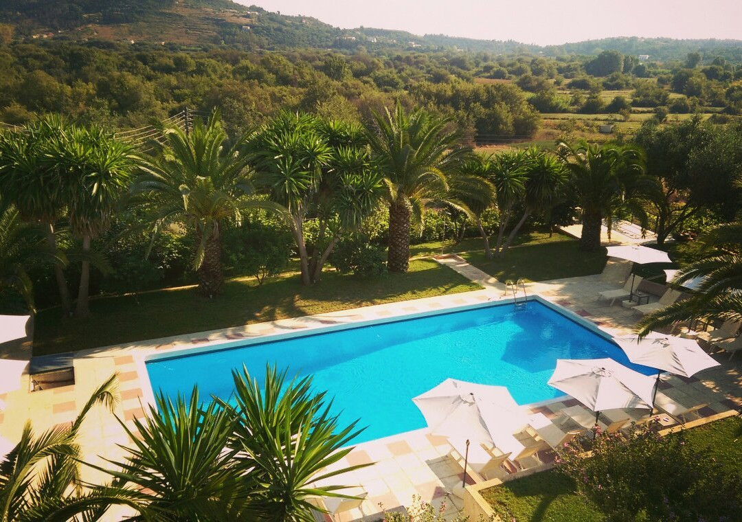 The Palm Garden - Idyllic Pool Apartments in a Green Oasis