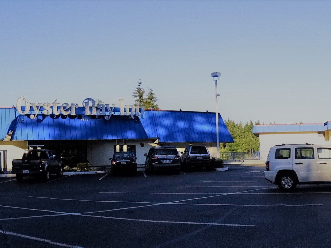 Oyster Bay Inn & Suites主图