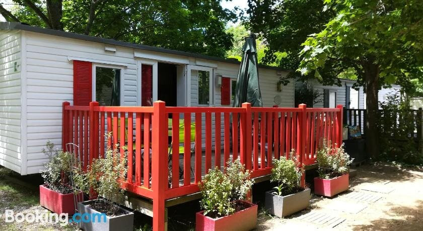 Mobil Home In The Shade Of The Yellow Train