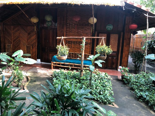 会安椰子树下民宿主图