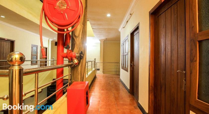 SPOT ON Mukkam Tourist Home