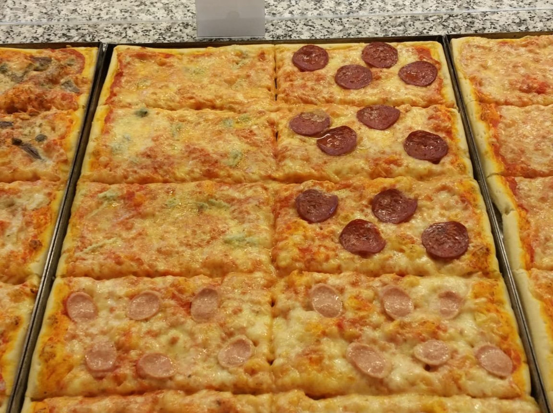 Pizzeria Paolo Taglio Pizza