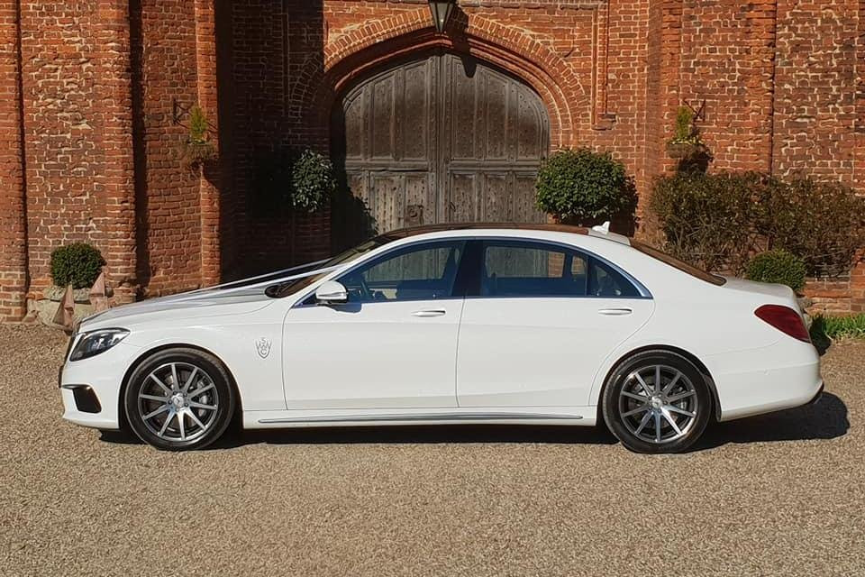 Simons white wedding cars景点图片