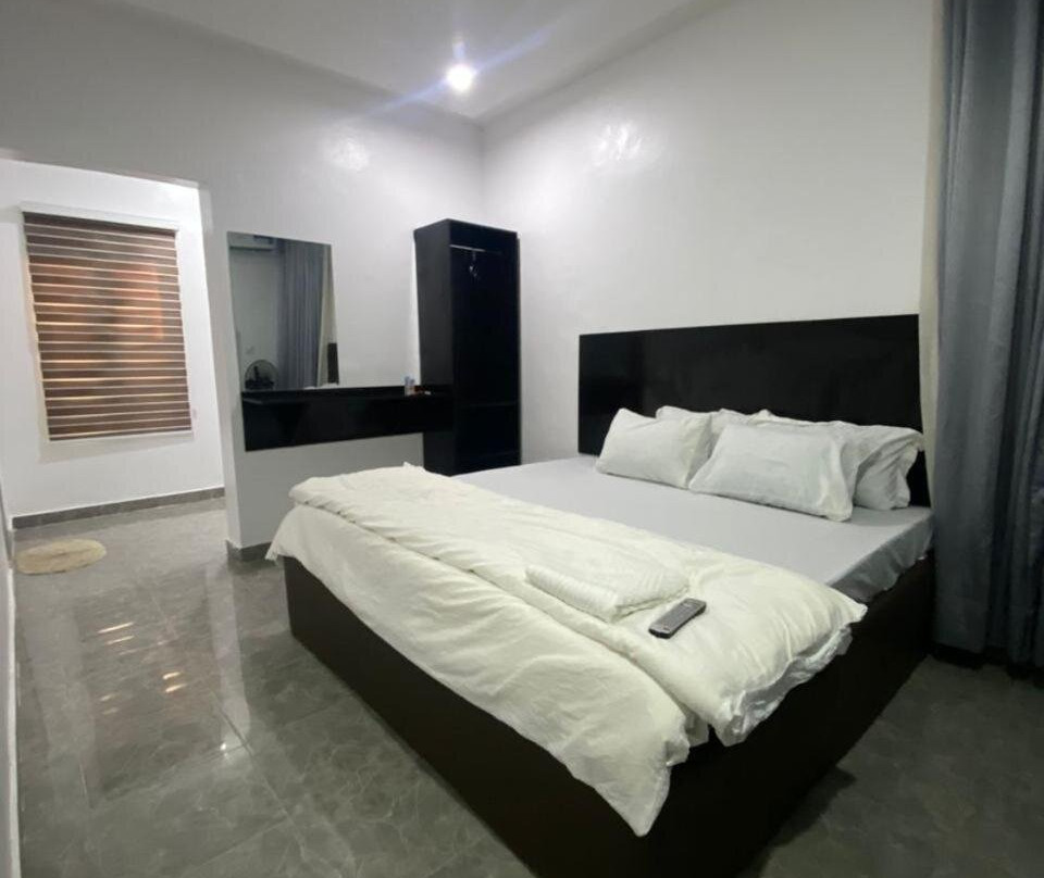 Homely Lodge & Apartments