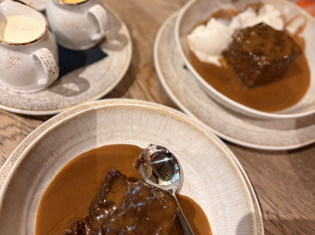 盖伊茅草村酒店主图