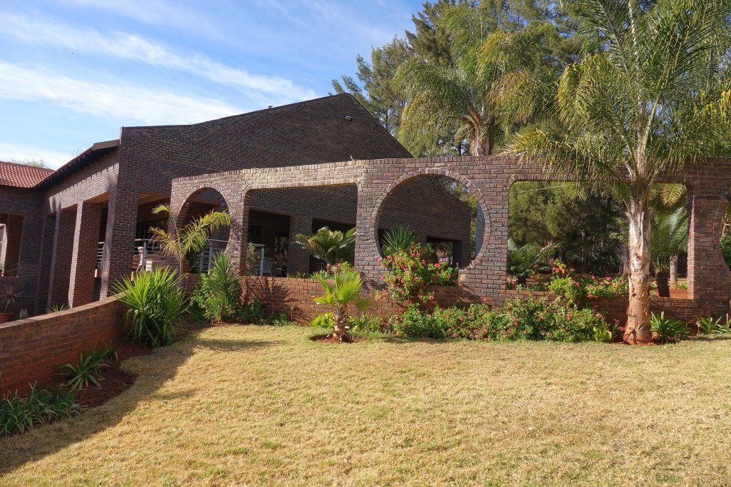 WoodRidge Palms Boutique Hotel主图