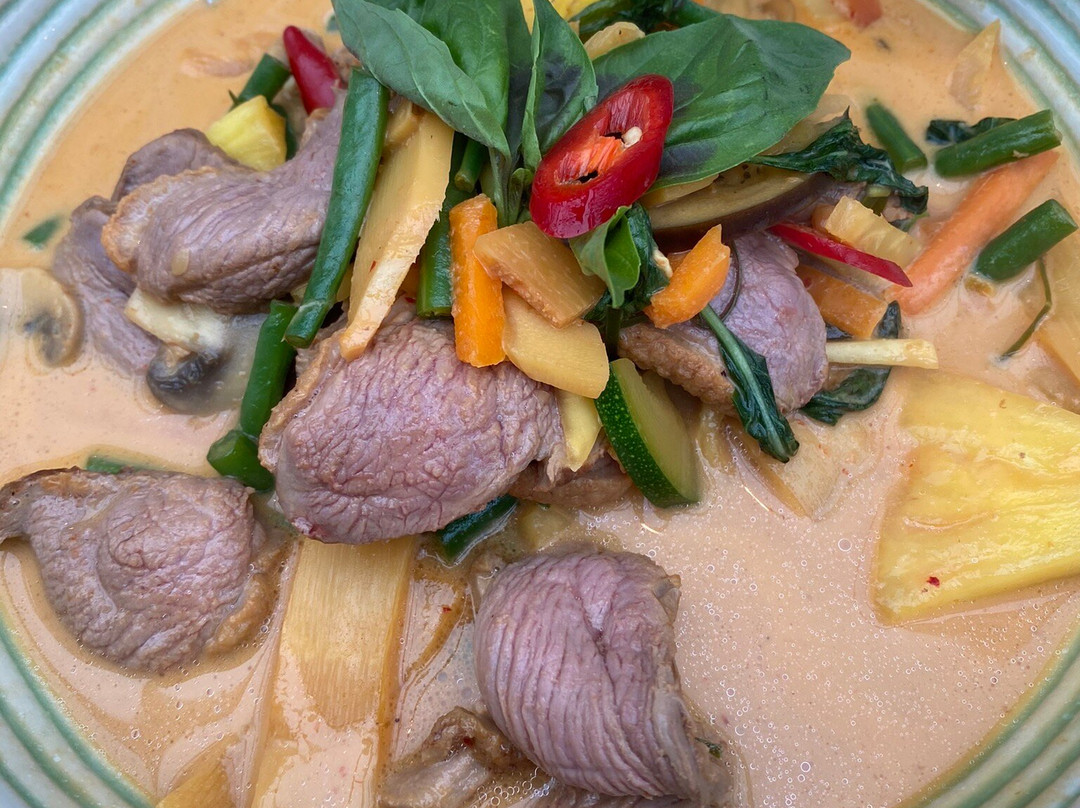 Mu Daeng Thai Restaurant Emblem