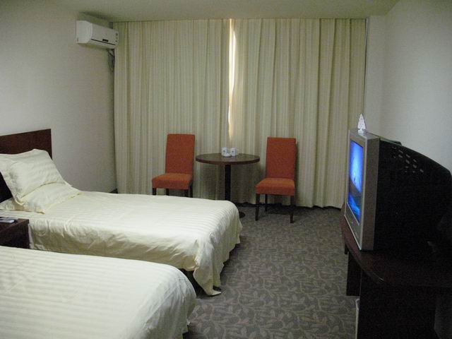 格林豪泰苏州乐园商务酒店-客卧