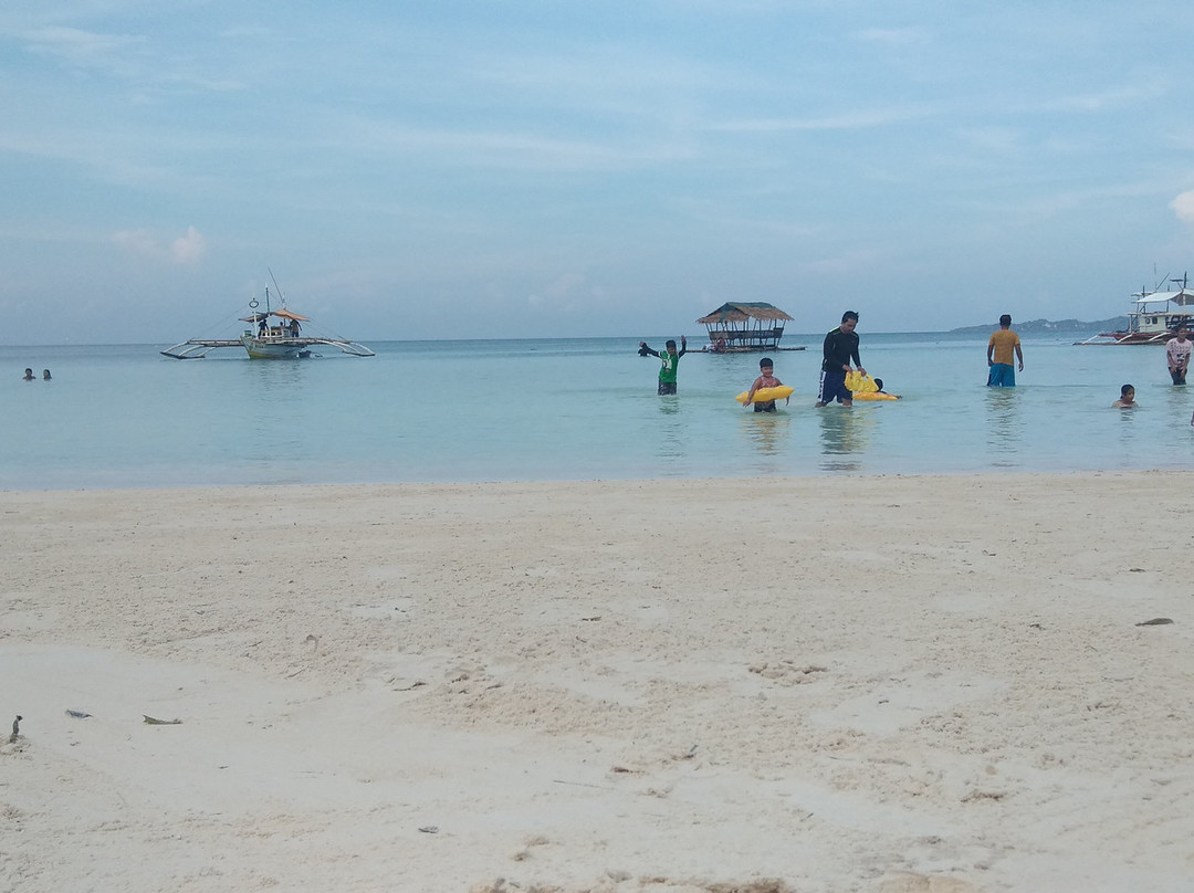 Inasakan Beach景点图片