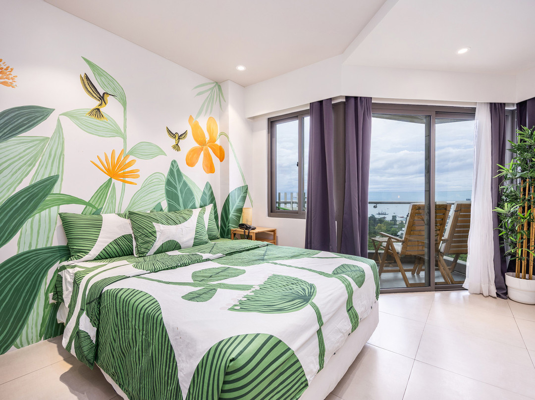 Jungle Studio at Tambuli Ocean View by Dominik Studio with Pool & Balcony in Mactan