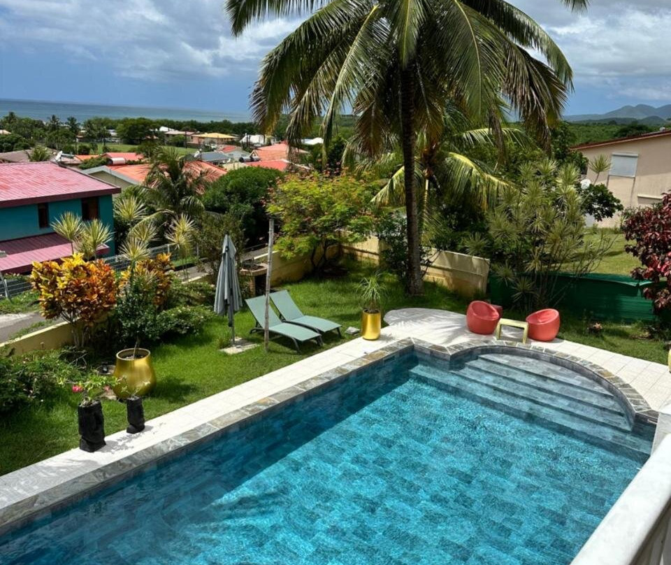 Villa sable et colibris