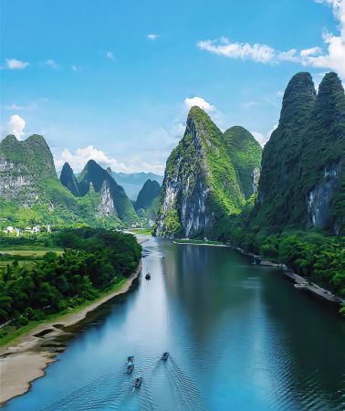 10D9N • Family Adventure Package:Includes tips,Enjoy Longji Terraces, Li River cruise, Yulong River bamboo rafting, Detian Transnational Waterfalland a full-day Weizhou Island tour.