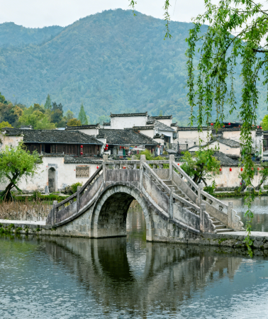 5D4N • Your tour includes complimentary tickets to the Huixiu show, a scenic climb up Huangshan, an exploration of the ink-wash charm of Hongcun, and a boat cruise on Qiandao Lake