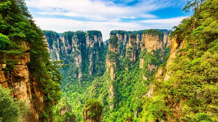 6D5N · Private Tours · Zhangjiajie Forest Park, Grand Canyon Glass Bridge, Tianmen Mountain & Twin Ancient Towns. Limited-time complimentary 72 Qilou Night View Check-in