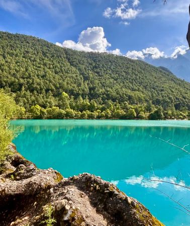 7D6N • Lijiang + Shangri-La + Lugu Lake: Specialty meals + Mosuo bonfire party + pig-trough boat ride + Lijiang Ancient Town Mufu Palace + Tiger Leaping Gorge + Tangka painting + Yulong Snow Mountain