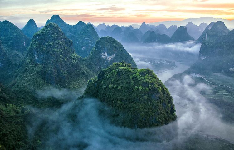 16-day 15-night · Private tours · Beijing + Xi'an + Guilin + Yangshuo + Chengdu + Chongqing + Shanghai · Embark on an All-Inclusive China Tour featuring private transfers, an English-speaking guide, comfortable hotel accommodations, and iconic attractions. Discover Beijing's Mutianyu Great Wall, explore Xi’an's Shaanxi History Museum and Big Wild Goose Pagoda, marvel at Guilin's Longji Terraces, experience the magic of Shanghai Disneyland, visit Chengdu's Giant Panda Base, and explore Chongqing's Hongya Cave.