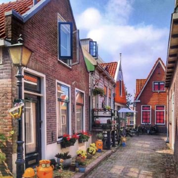 荷兰阿姆斯特丹福伦丹-马德罗丹微缩城-桑斯安斯风车村一日游