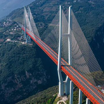 乌蒙大草原+北盘江大桥一日游【上门接送-无购物】