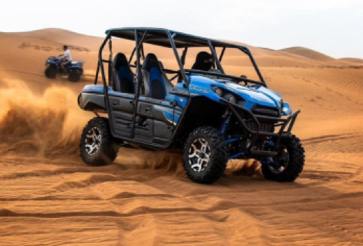 豪华沙漠探险套餐：含四轮摩托冲沙、骑骆驼、烧烤晚餐及现场表演【沙漠探险之旅：四轮摩托车或沙丘车体验，沙丘冲浪，含接送服务 滑沙、骑骆驼及现场表演（肚皮舞、火焰秀等） 烧烤晚餐（素食与非素食）】