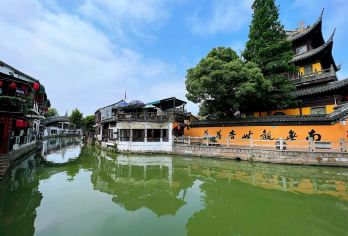 商务车丨英文导游丨朱家角+陆家嘴+复兴公园1日【[精选景点]朱家角古镇（含游船）深度漫游，陆家嘴+复兴公园体会上海风情！】