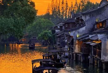 上海往返嘉兴乌镇私家团1日游（可选中/英文导游）【远离城市的喧嚣，沉浸在江南水乡的古镇里】