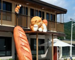 Now Open: Sleepy Cat Town by the Great Wall