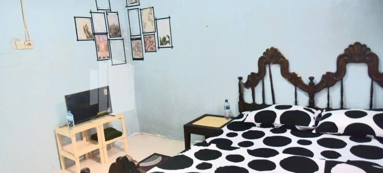 卢马姜红多兹樊塔民宿(RedDoorz @ Fanta Homestay Lumajang)图片