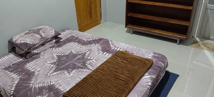 红色伙伴比鲁民宿酒店(Maulana Homestay - by Login)图片
