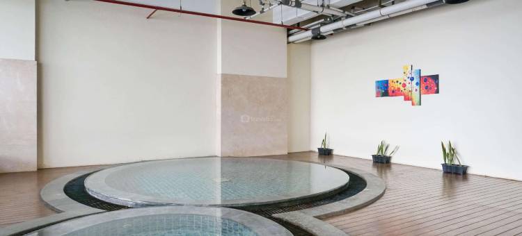 在Atlanta Residences的温暖如家的1卧室公寓，由Travelio提供(Warm and Homey 1Br Apartment at Atlanta Residences by Travelio)图片