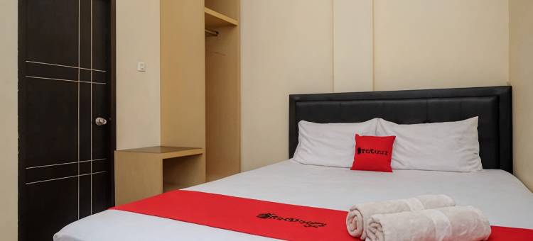 直葛市阿兰英达海滩公园红多兹酒店(RedDoorz Near Taman Pantai Alam Indah Tegal)图片