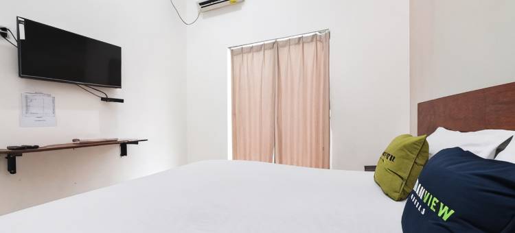 瑞德多兹酒店 - 近班贾尔马辛佳兰艾哈迈德沙亚尼(Urbanview Hotel Ava Banjarmasin by RedDoorz)图片