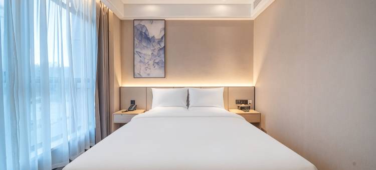 星程酒店(奎屯体育中心西公园店)图片