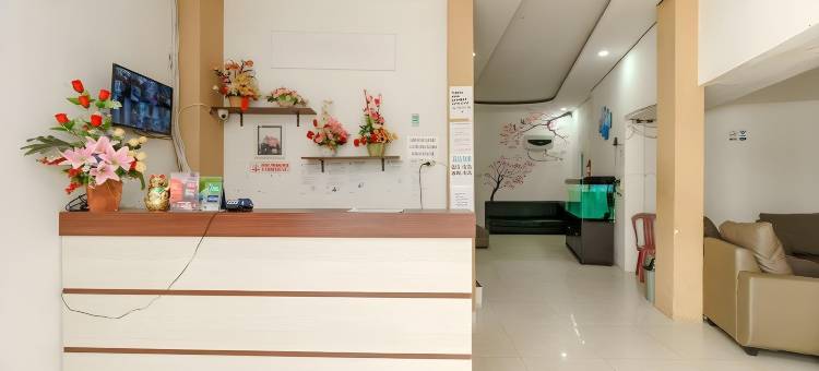 瑞德多兹酒店 - 近巨港贸易中心(RedDoorz at Tara Homestay Palembang)图片