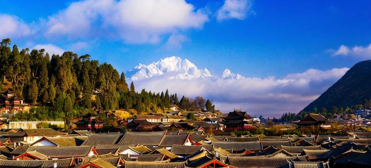 丽江古城大水车·忆梦尘风日照金山雪山观景客栈图片