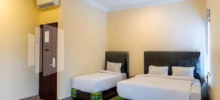 亚当马利克宾馆-靠近丽嘉ICC棉兰-米特拉红门酒店(Adam Malik Guesthouse Near Regale ICC Medan Mitra RedDoorz)图片