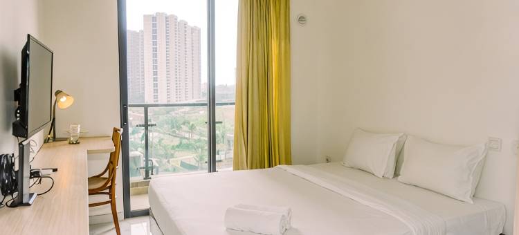 Well Furnished and Comfy Studio Sky House BSD Apartment By Travelio图片