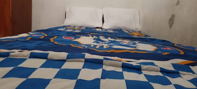 O乐威家庭宾馆-靠近GBKP邦温穆利亚11公里(Hotel O Lewi Family Guest House Near Gbkp Bangun Mulia Km. 11)图片