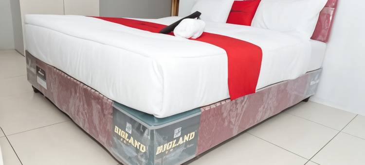 红多兹Plus酒店-近万鸦老凯拉吉杜亚特兰斯超市(RedDoorz Plus Near Transmart Kairagi Dua Manado)图片