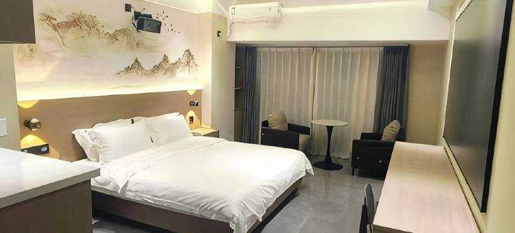 寓东观影酒店(万邦国际批发市场店)图片